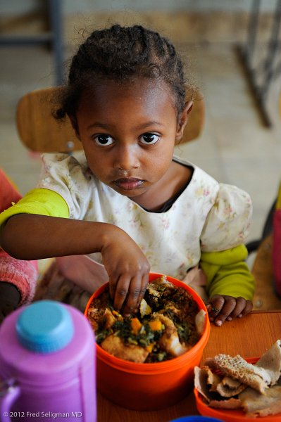 20120328_101930 Nikon D3S 2x3.jpg - Note that Ethiopians eat with their right hand using injera to pick up their food